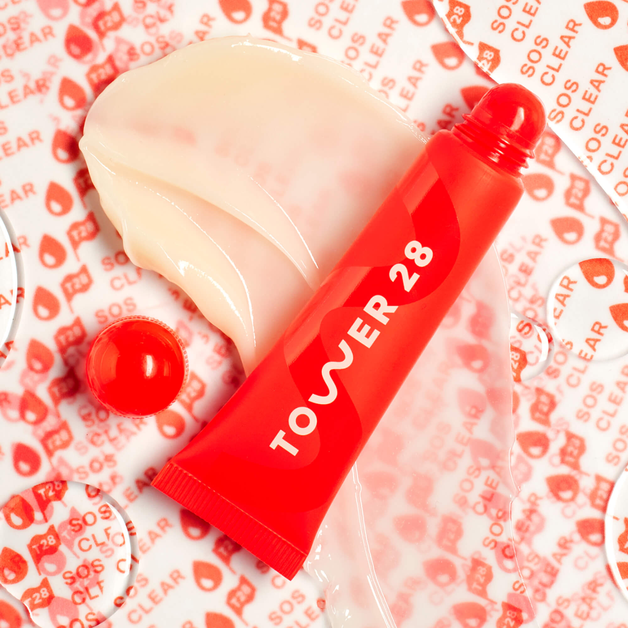 The Tower 28 Beauty LipSoftie™ Lip Treatment in the shade SOS Vanilla. [SOS Vanilla]