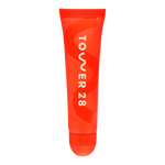 The Tower 28 Beauty LipSoftie™ Lip Treatment in the shade SOS Vanilla. [SOS Vanilla]