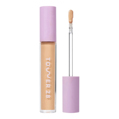 Tower 28 Beauty Swipe Serum Concealer in the shade 9.0 MDR, shown with the tube standing upright next to the open applicator wand to reveal the product. [9.0 MDR]